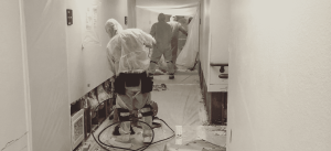 Asbestos Decontainment in a Hallway