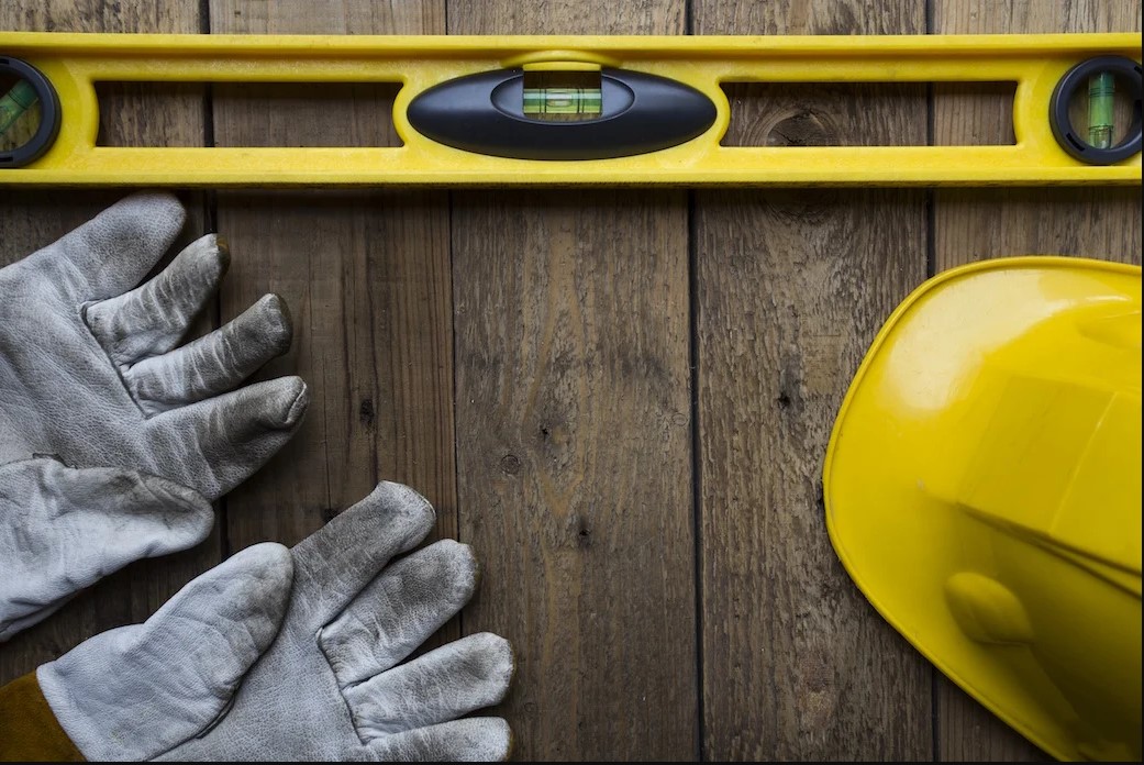 Blog - Safety Gloves, Helmet, and a Level
