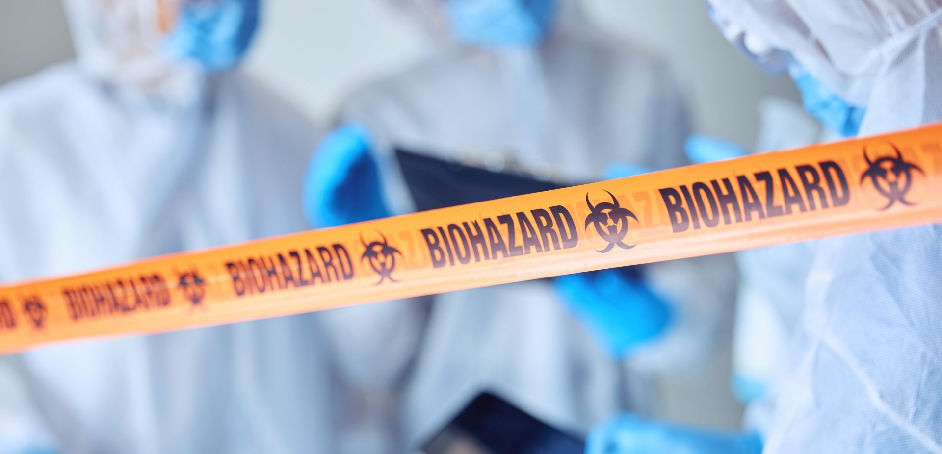 Biohazard caution tape on a scene